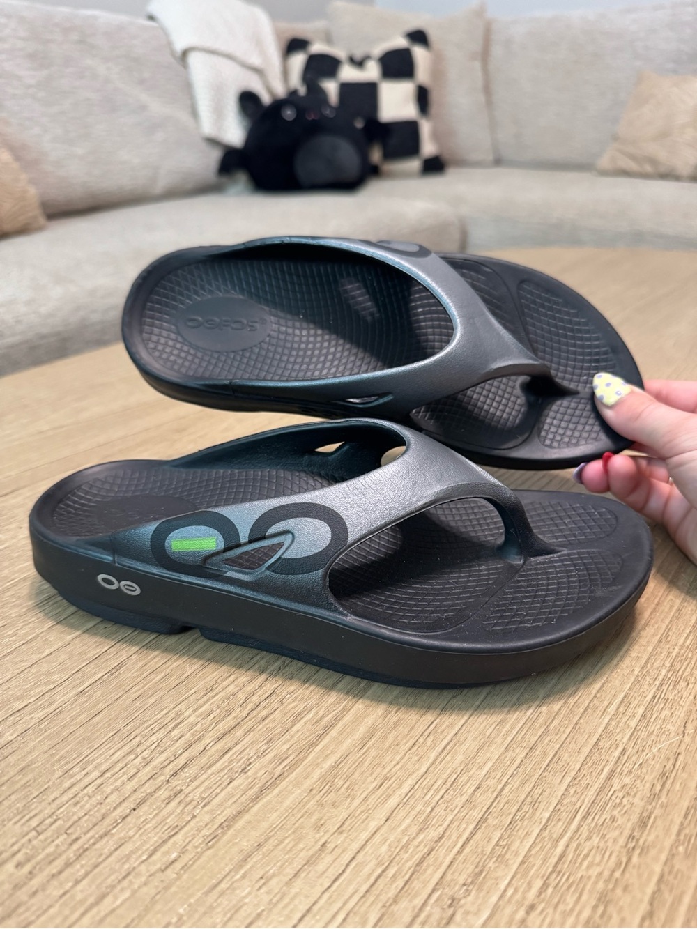 OOFOS Black Recovery Flip Flops with Subtle Green Accent